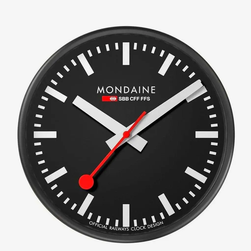 Black stainless steel wall clock 25cm elegant and modern addition to bedroom office or living room walls.