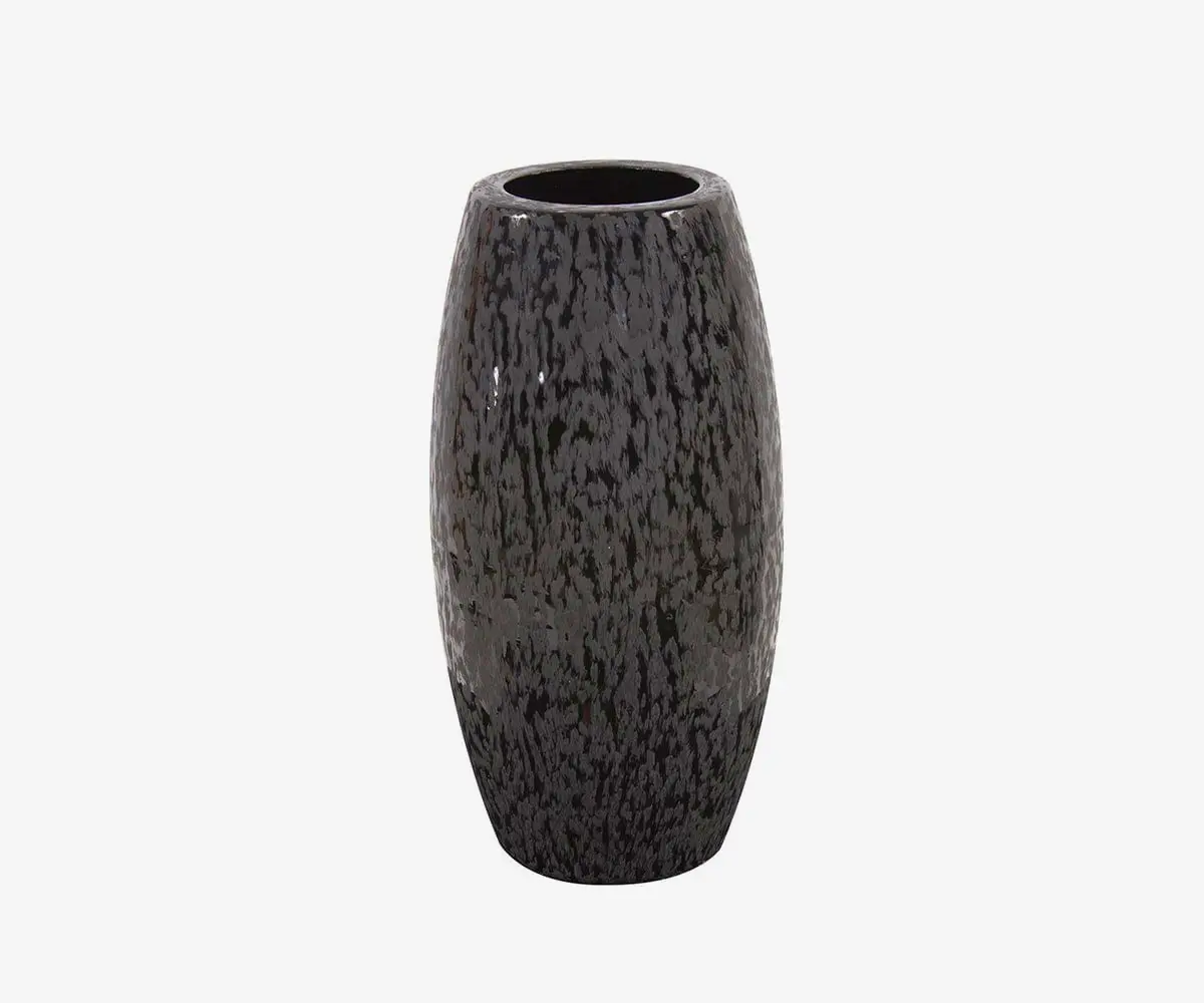 Small chiseled black vase modern and minimalist decor.