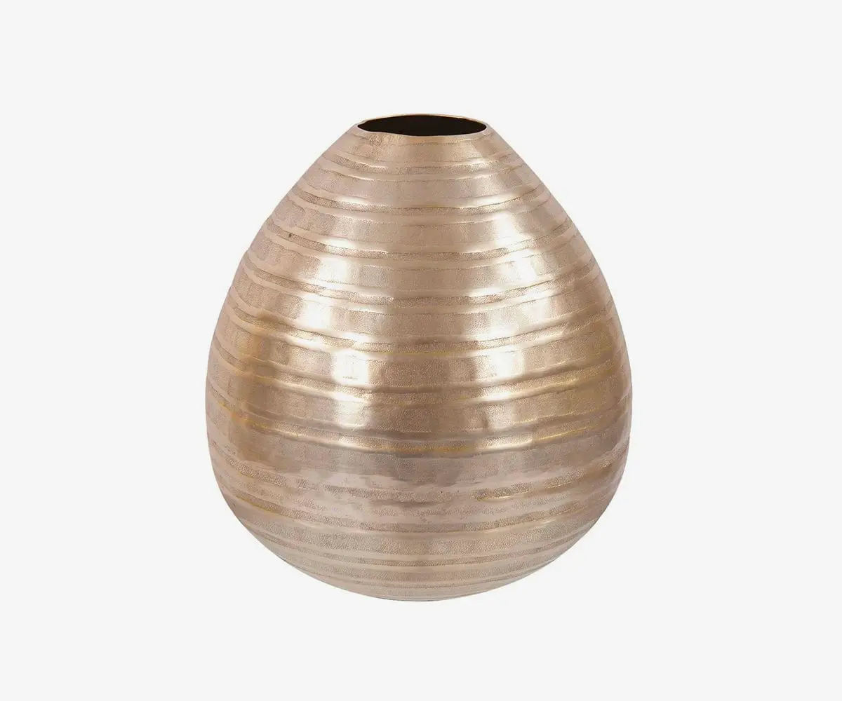 Small chiseled champagne vase elegant and stylish accent.