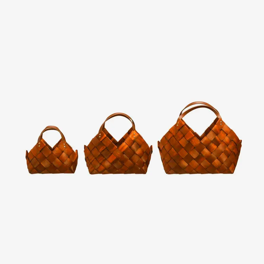 Handcrafted woven baskets with handles in multiple sizes perfect for living room storage entryway organization or bathroom toiletries