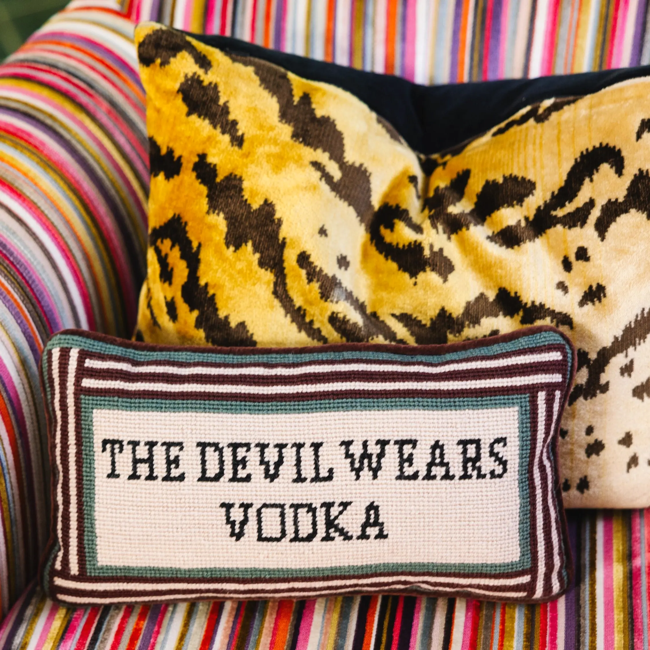 Devil Wears Vodka needlepoint pillow for home bar or lounge.