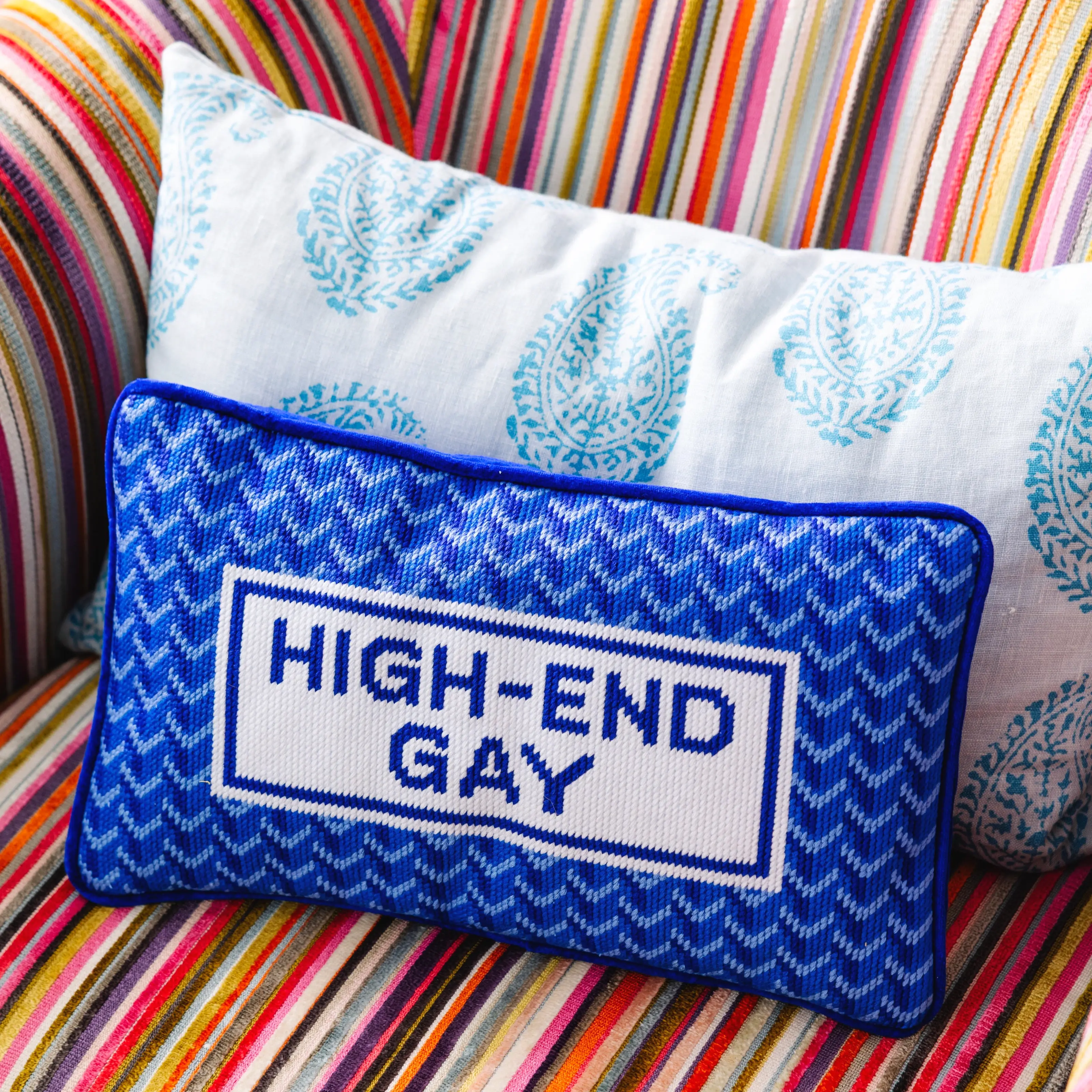 High End Gay needlepoint pillow for stylish LGBTQ+ home decor.