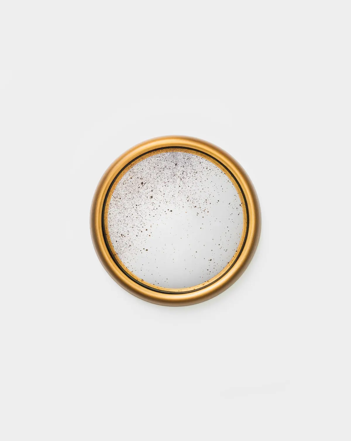 Juliette antiqued gold convex mirror, a vintage-inspired decor piece for hallways, living rooms, or above fireplaces.