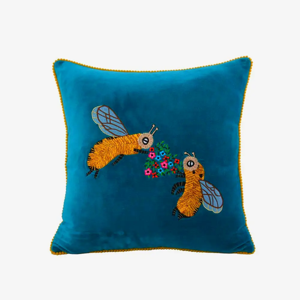 Bee velvet pillow for cozy living room by Karma Living