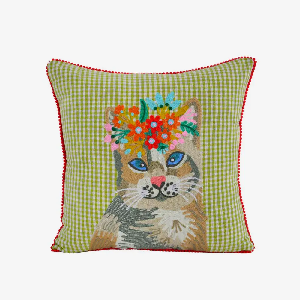 Cat cushion for playful bedroom decor by Karma Living