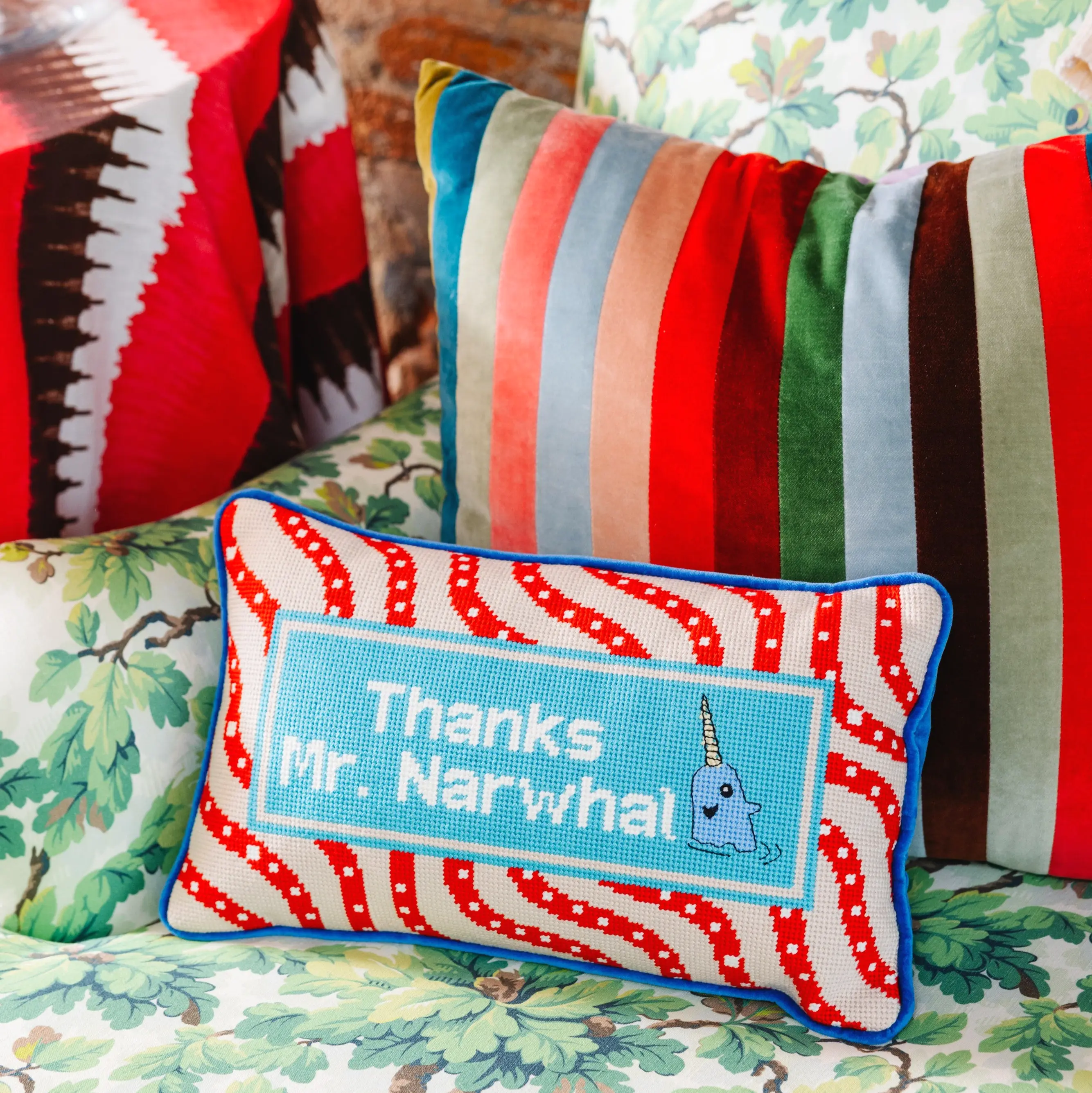 Narwhal Christmas needlepoint pillow for whimsical holiday decor.