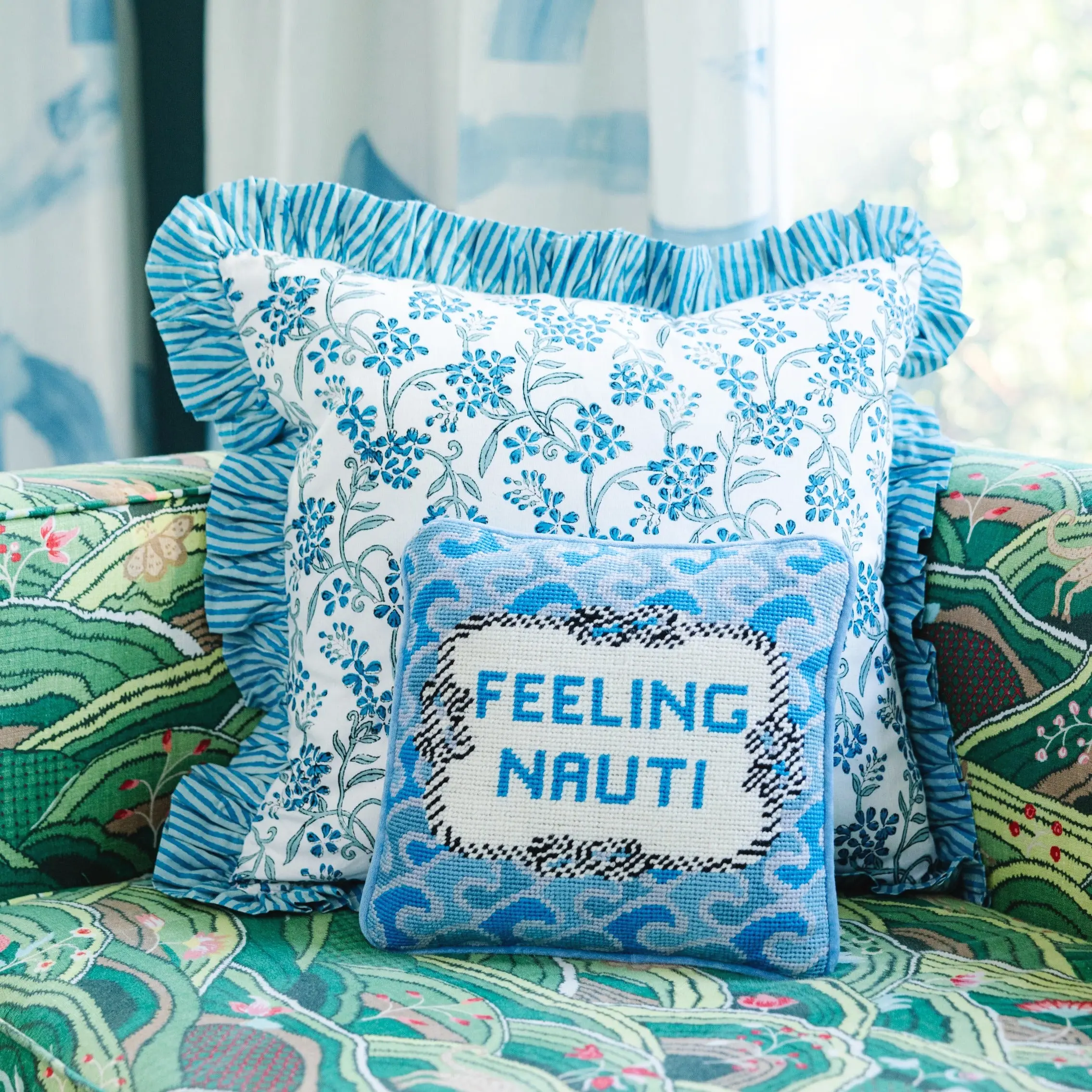 Nauti needlepoint pillow for coastal or nautical bedroom.