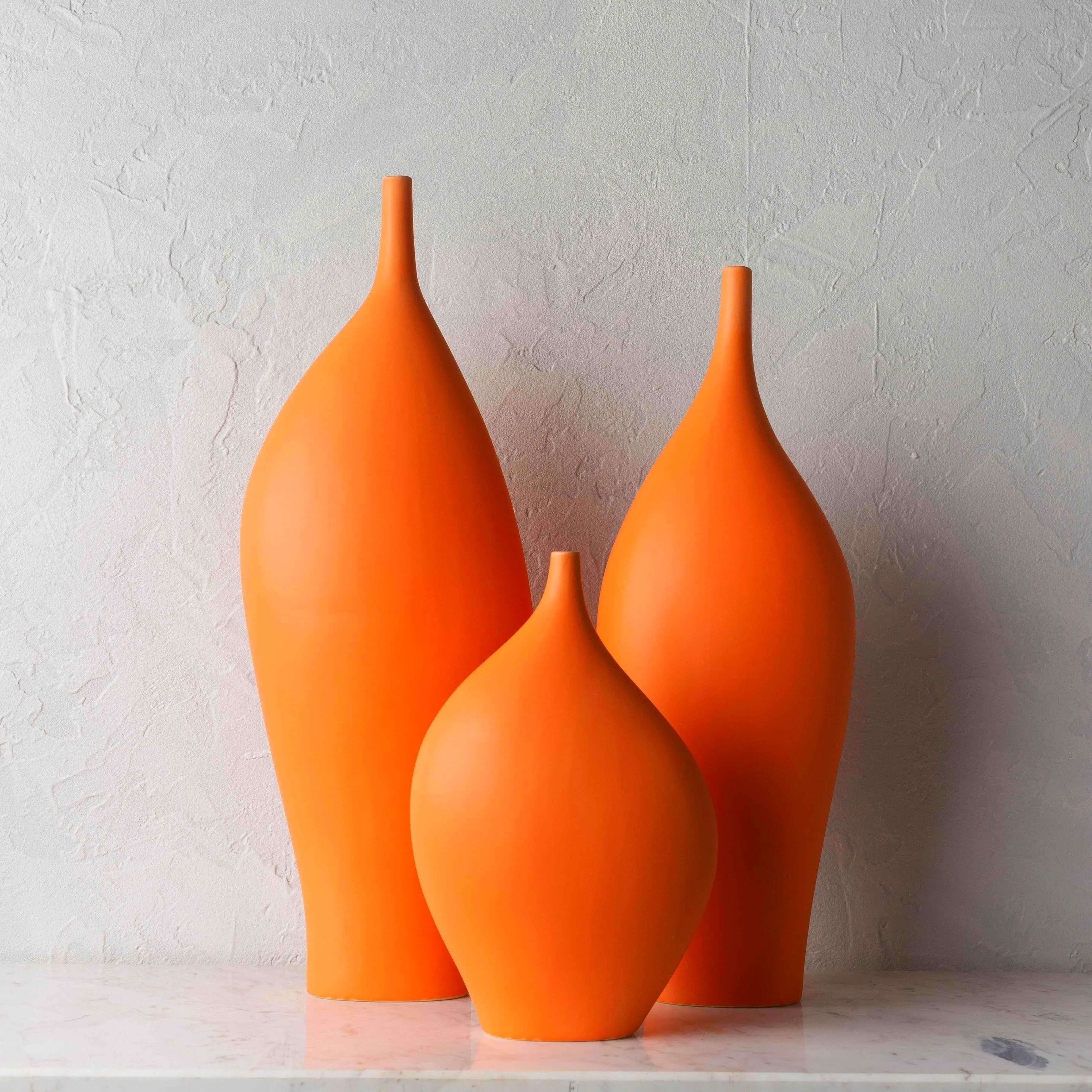 Orange ceramic vase set in varying heights - bold contemporary accent trio for living room shelves, mantel or dining table