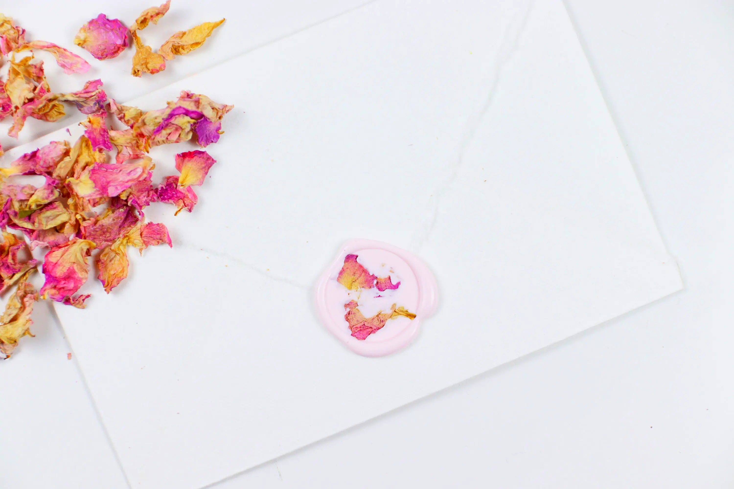 Pink Rose Petals wax seals in pastel pink, great for personalized stationery, love letters, and elegant gifting.