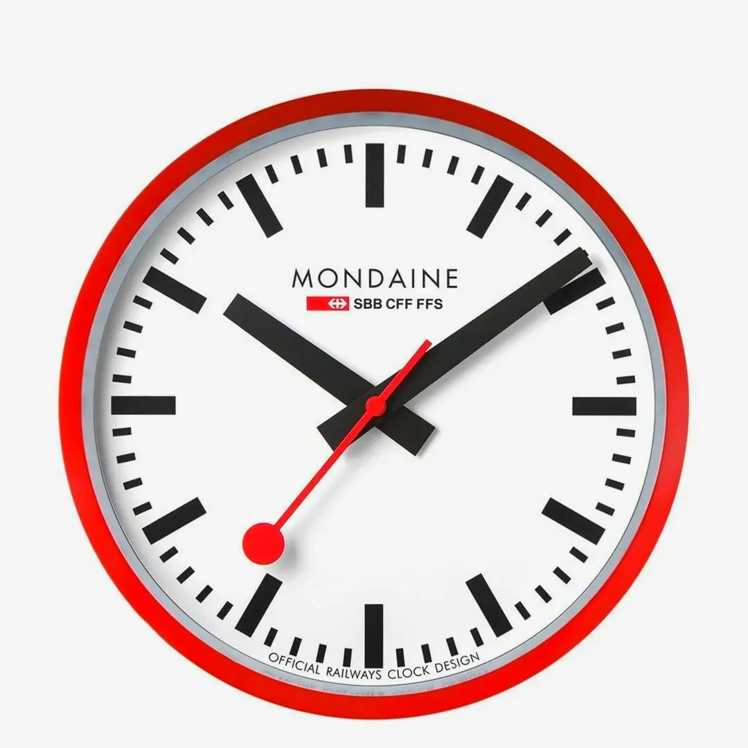 Red stainless steel wall clock 25cm stylish and bold accent for kitchen office or contemporary home decor.