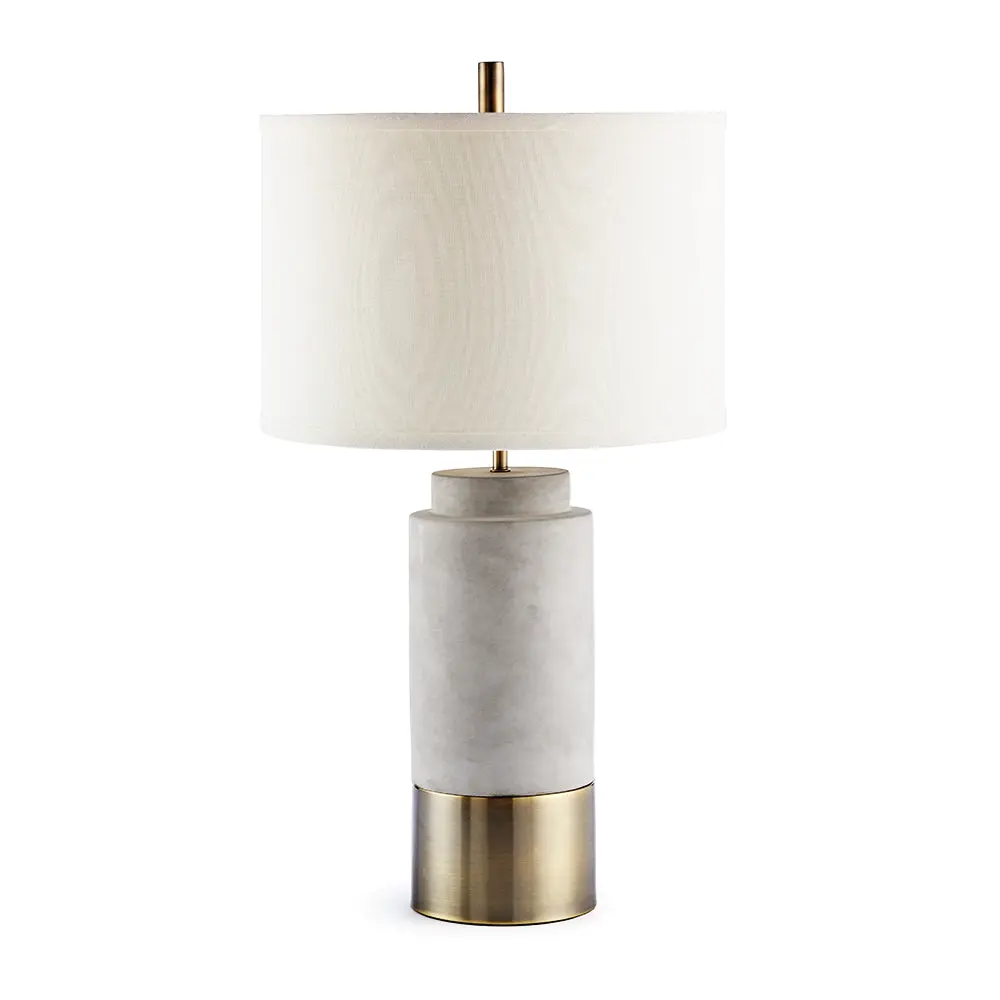 Scully brass cylinder table lamp for modern desks or chic living room consoles