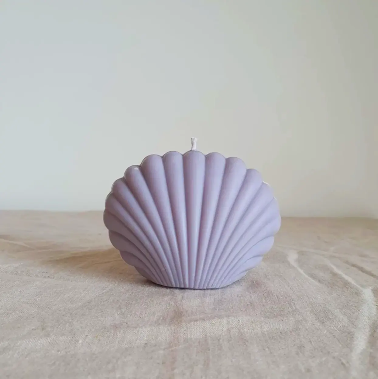 Decorative Shell Shaped Candle in coastal colors perfect bathroom decor or bedroom nightstand accent for beach themed homes