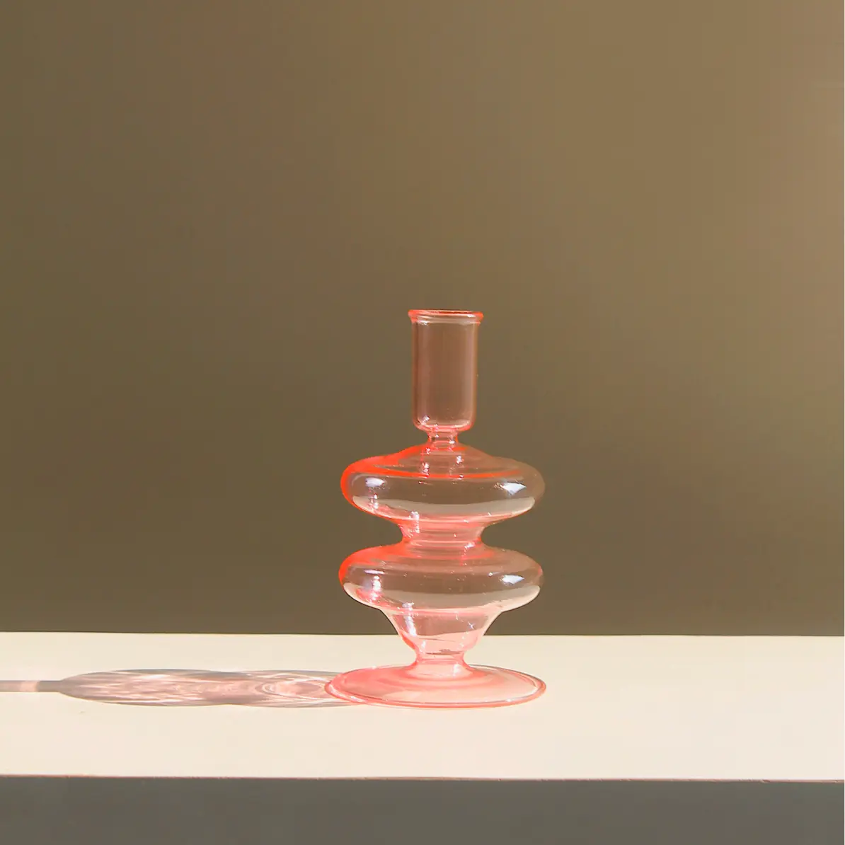 Siri candle holder in multiple sizes an elegant accent piece for living rooms dining tables and home decor.