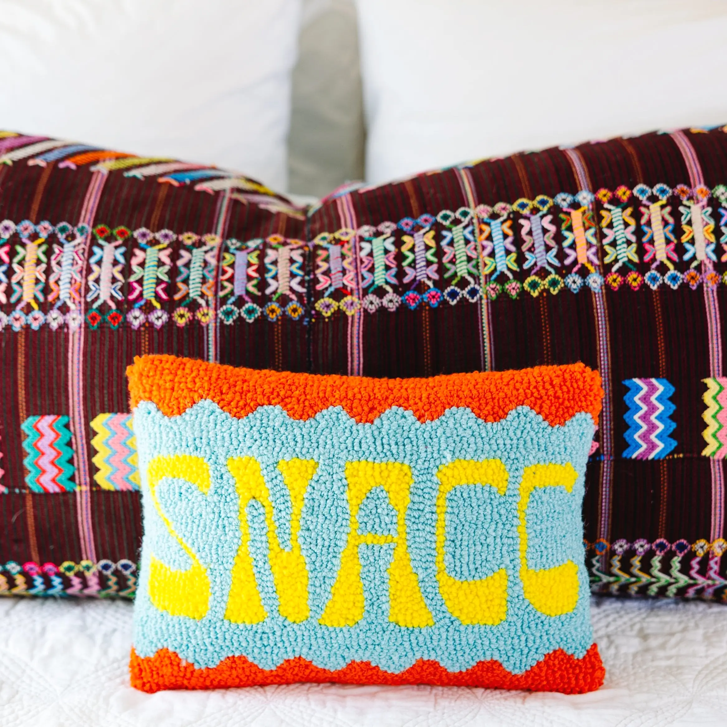 Snacc hook pillow for humorous kitchen or bedroom decor.