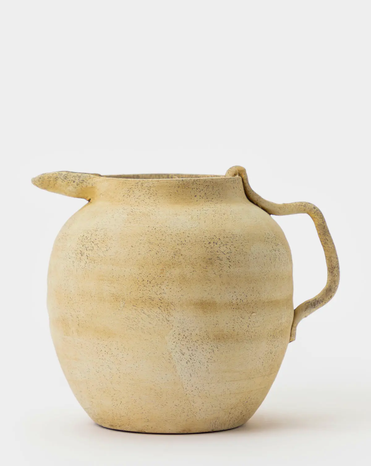 Weathered ceramic jug vase for living room decor. Vintage style accent vase.