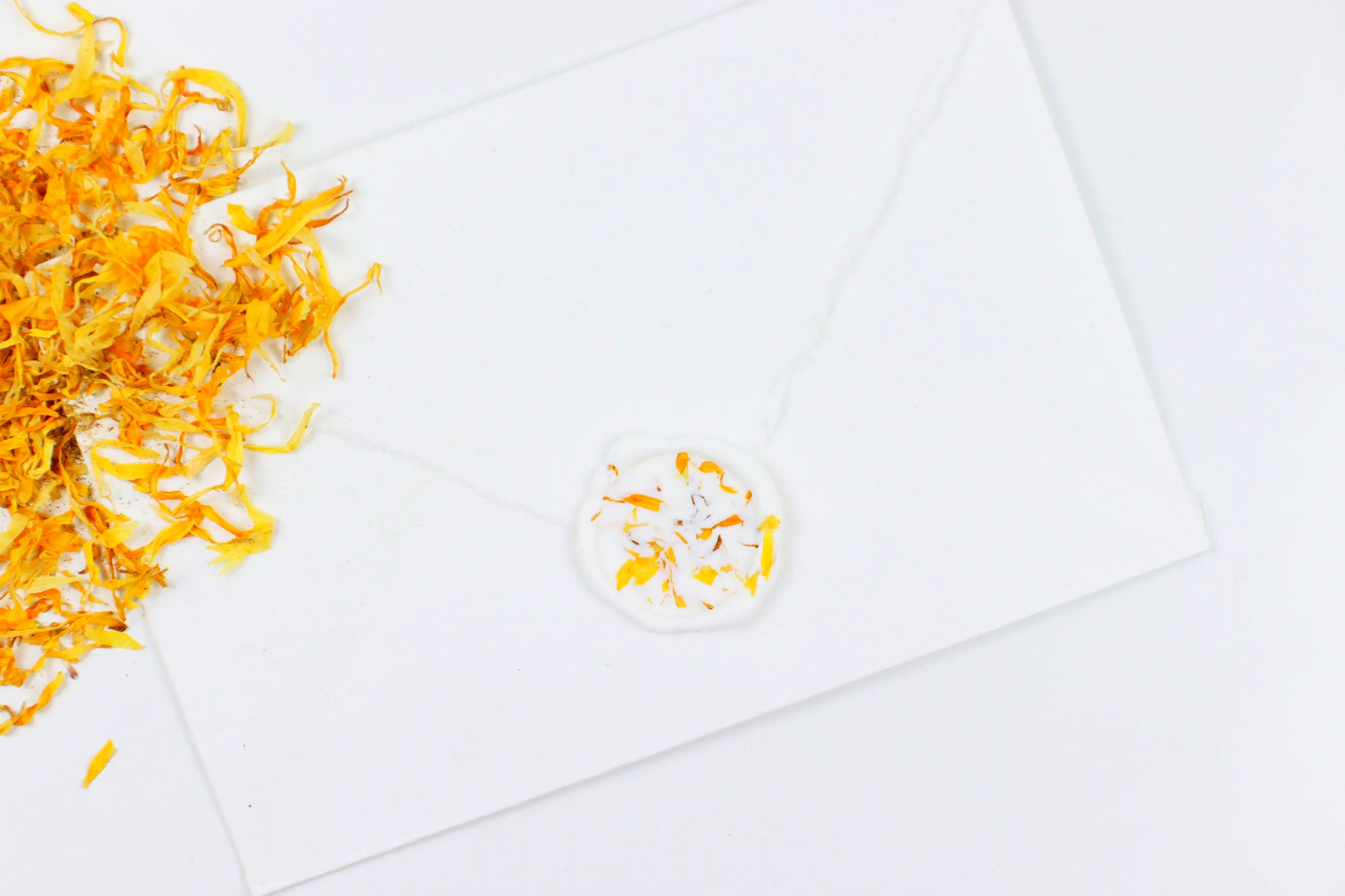 Yellow Cornflowers on White Wax Seal Pack of 10 or 25 for brightening invitations or journals.