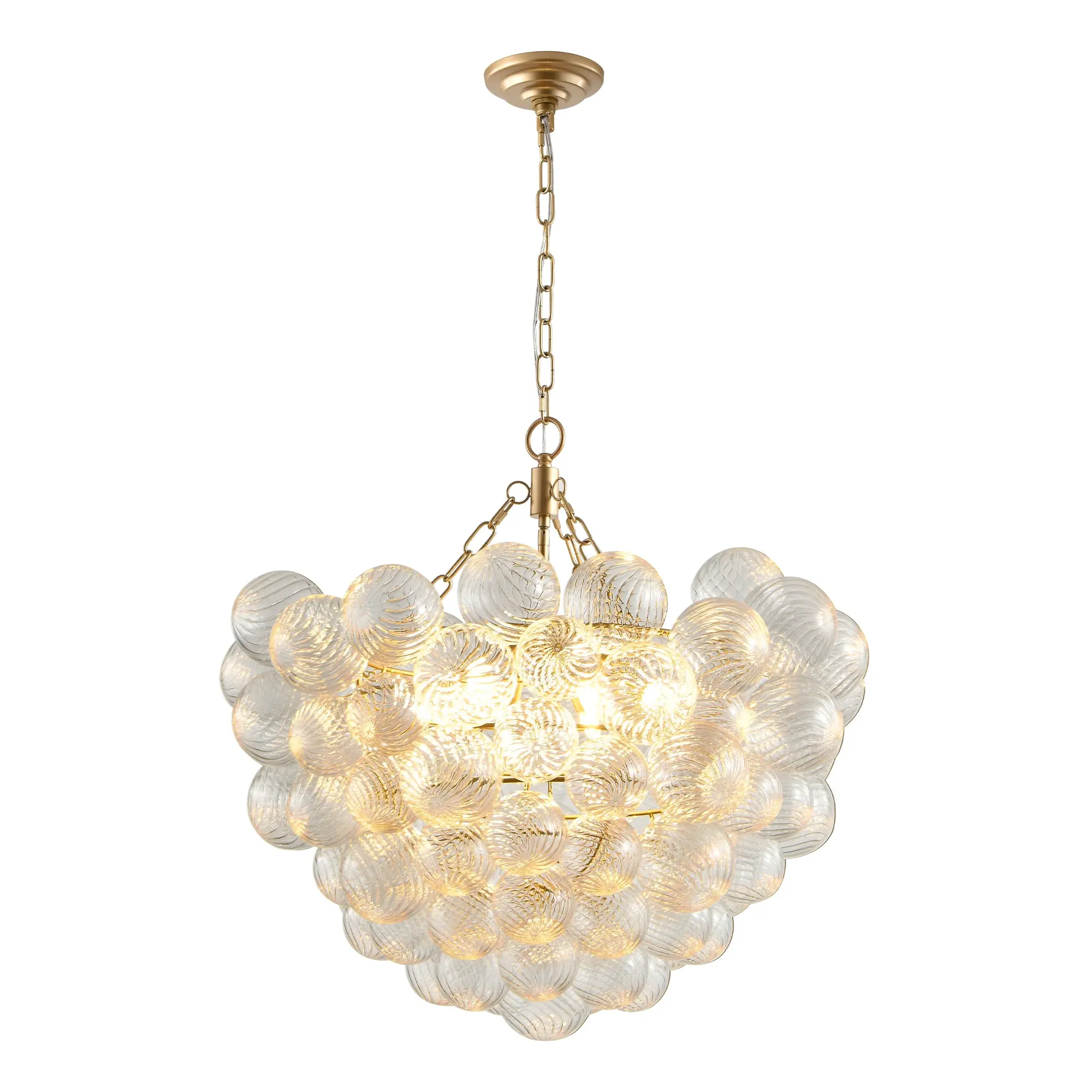 Elegant gold pendant chandelier with clear glass globe shade, ideal for living room or modern dining space